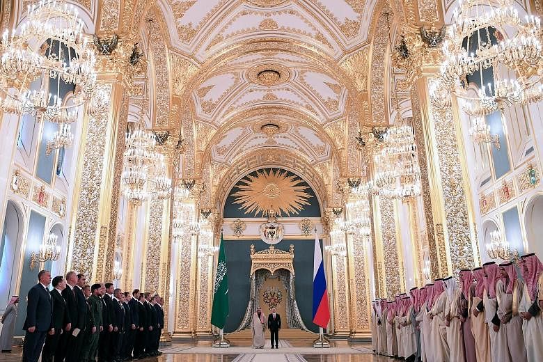 Saudi King Salman bin Abdulaziz and Russian President Vladimir Putin at a welcoming ceremony in the Kremlin, Moscow, on Thursday. During the first visit to Russia by a Saudi monarch, the two countries have already struck a deal on weapons sales and d