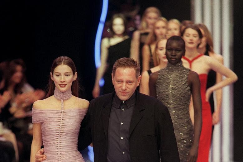 Mr Herve Leroux at a show of his collection in 1999. He made his iconic dress from bands of yarn meant to be thrown away.