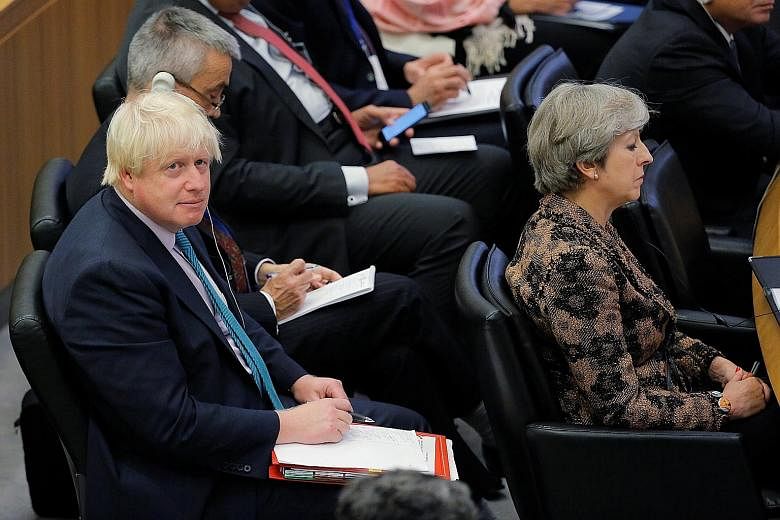 British Prime Minister Theresa May and Foreign Secretary Boris Johnson at the UN General Assembly last month. Mr Johnson has been accused by some of undermining Mrs May.