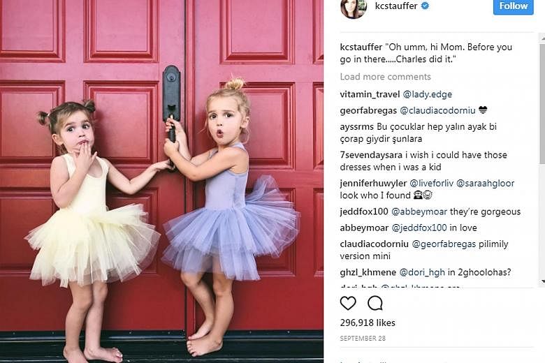 Mila (left) and Emma Stauffer, two-year-old twins who have done advertising work for companies such as Amazon, Macy's and Walmart. They became stars after appearing in a video on their mother's Instagram page that garnered 4.4 million views.