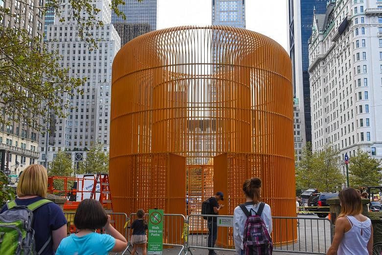 Another sculpture (left) is constructed under the Washington Square Arch (left below). One of Ai Weiwei's sculptures for his project, Good Fences Make Good Neighbours, near Central Park in New York City.
