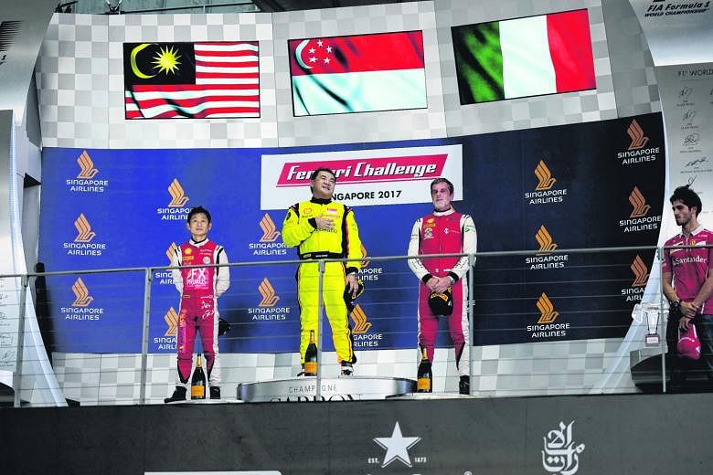A proud Ringo Chong on the podium at last month's Ferrari Challenge Asia-Pacific with Malaysia's Zen Low (second) and Italy's Angelo Negro.