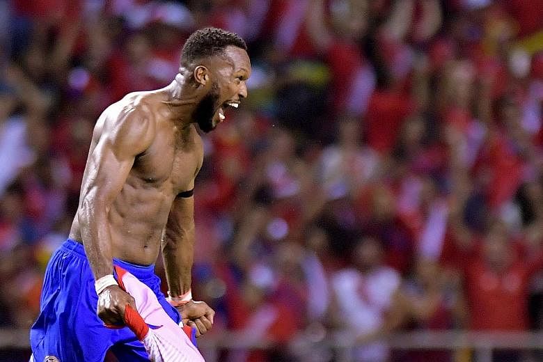 Costa Rica's Kendall Waston celebrating his last-gasp equaliser against Honduras which sent his country to the 2018 World Cup Finals. They will be making their fifth finals appearance.