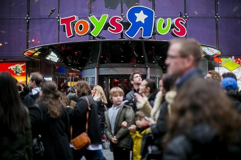 The Toys 'R' Us store at Times Square in New York. In its Chapter 11 bankruptcy process, Toys 'R' Us plans to argue that its annual cash flow of roughly US$800 million (S$1.09 billion) would make it viable if its US$5.2 billion debt is significantly 