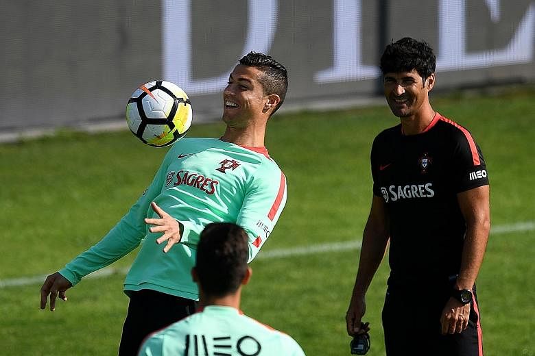 Portugal captain Cristiano Ronaldo is all smiles in training ahead of today's final qualifying home match against Group B leaders Switzerland. Only a win will do for the European champions.