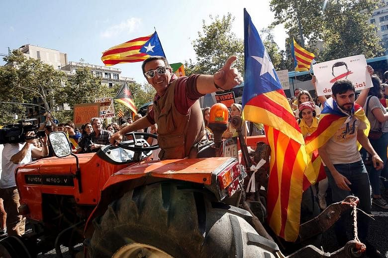 Farmers in Catalonia have lent their strength to independence marches, riding with the demonstrators, parking their tractors outside polling stations as a line of defence against intervention by the Spanish police.