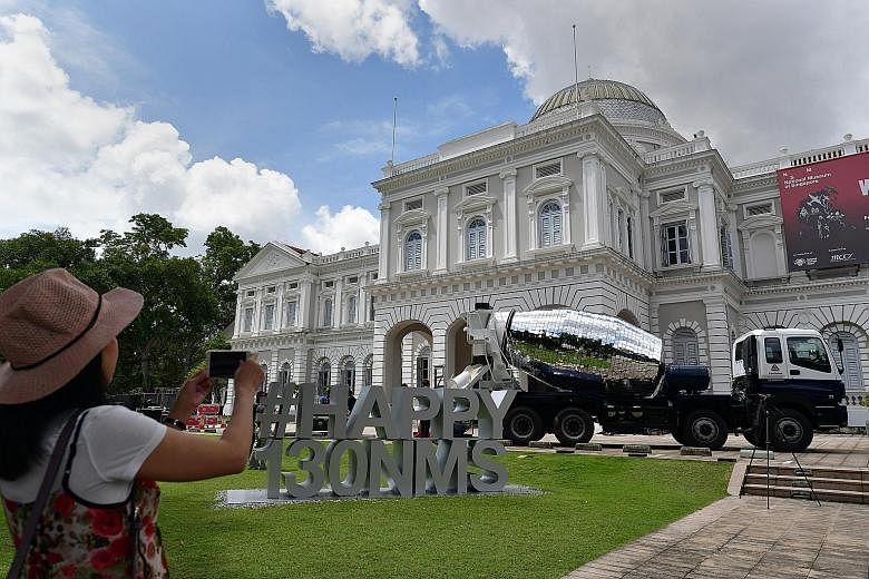 The installation La Betonniere Boule A Facettes on the front lawn of National Museum Singapore.