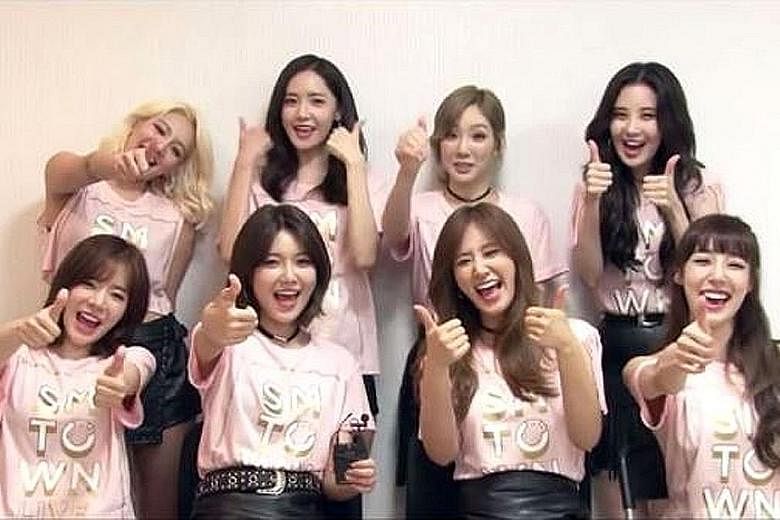 Girls' Generation members (back row from left) Hyoyeon, Yoona, Taeyeon, Seohyun and (front row, from left) Sunny, Sooyoung, Yuri and Tiffany.