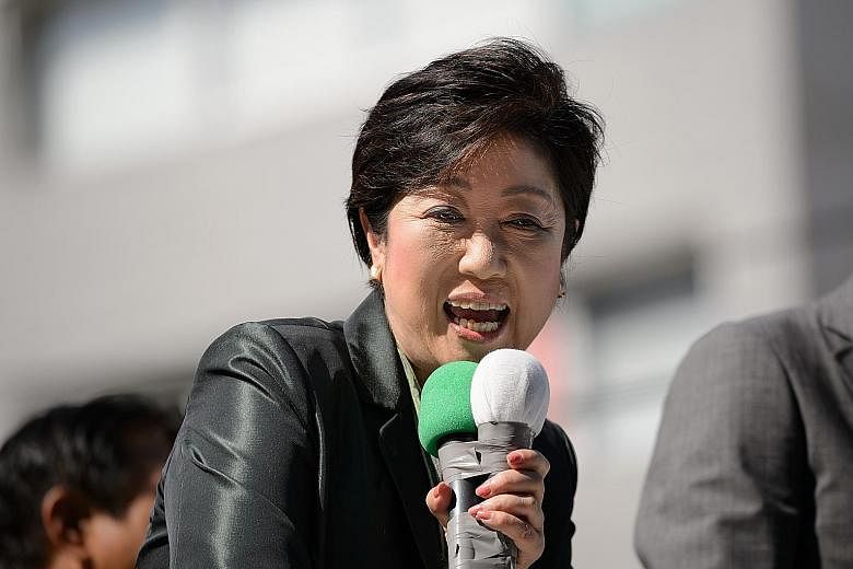 Ms Yuriko Koike founded the Party of Hope to take on her former party. Mr Shinjiro Koizumi has often been touted for higher office.