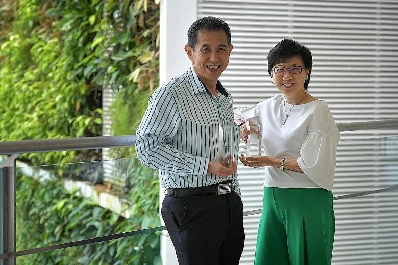 Mr Edmund Yu, senior project manager at Seagate Singapore, leads exercise sessions at his workplace, while Ms Lim Yee Juan, group chief financial officer of National Healthcare Group, started a programme called Fit and Fun to help her staff track wha