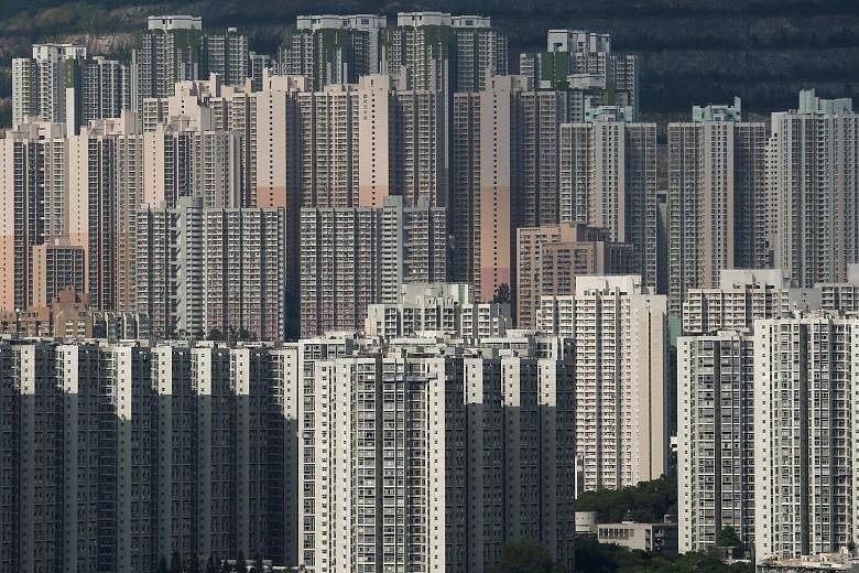 Home prices in Hong Kong surged to a historic high in August, with apartments costing an average of about HK$130,000 per sq m, according to property firm Midland Realty.