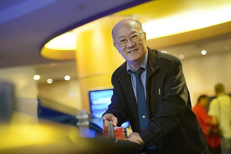 Retiree Yip Hoi Kee, 77, received Safra's long service award yesterday for his 45 years of membership. The event at Safra Mount Faber also marked Safra's 45th anniversary.