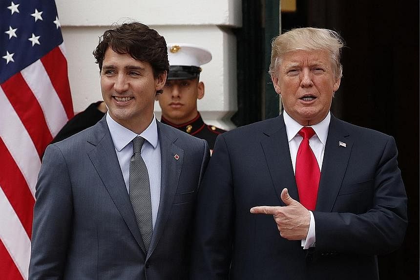 US President Donald Trump with Canadian Prime Minister Justin Trudeau at the White House in Washington on Wednesday. Speaking to the media during Mr Trudeau's visit, Mr Trump said of the Nafta talks: "It's possible we won't be able to make a deal, an