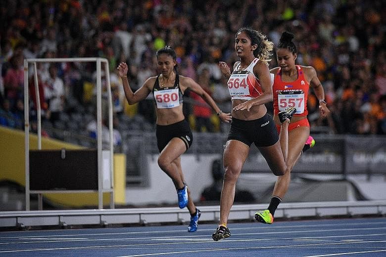 Shanti Pereira, defending her 200m title from the 2015 Singapore SEA Games, crossing the finish line in third place in August in Kuala Lumpur. She admitted afterwards that she had been affected by the discord in the athletics association.