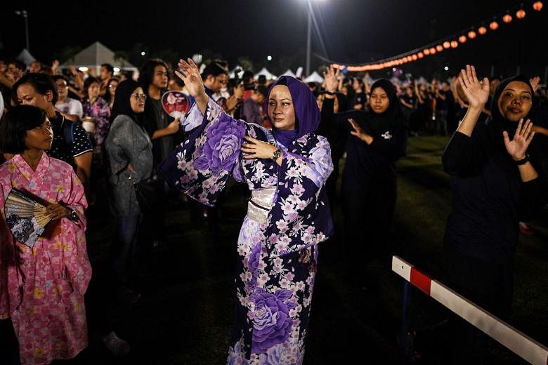 Hundreds of kimono-clad people, including Japanese nationals and Malaysians, celebrated an annual Japanese summer festival in Shah Alam in July. Malaysia's Council of Rulers has called on Malaysians to uphold the country's cherished multicultural, in