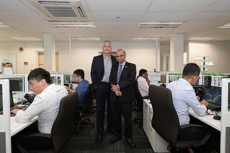 Law Society Pro Bono Services chief executive officer Lim Tanguy (left) and chairman Gregory Vijayendran in the new LSPBS office.