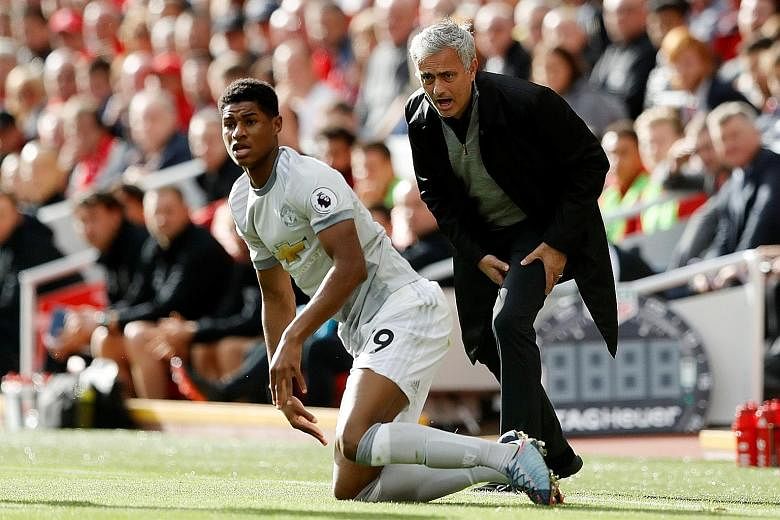 Jose Mourinho shows the strain as Marcus Rashford takes a tumble during the 0-0 draw. The Manchester United manager admitted that Liverpool's midfield had dictated terms and he had not been able to counter their strength.