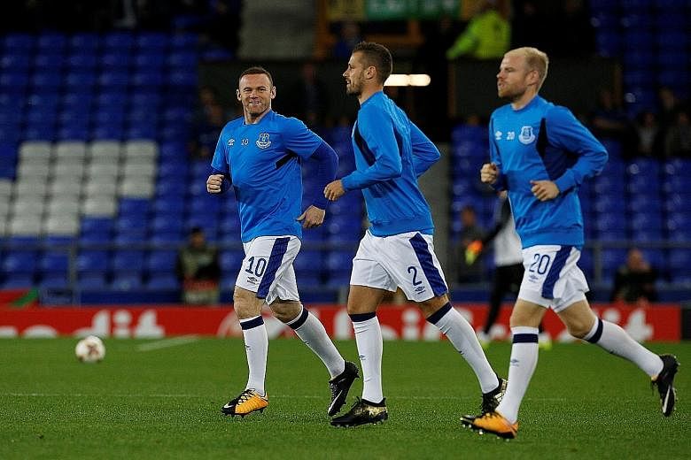 Wayne Rooney (left, with Morgan Schneiderlin) could return to Everton's line-up. He was dropped for Everton's last match against Burnley.