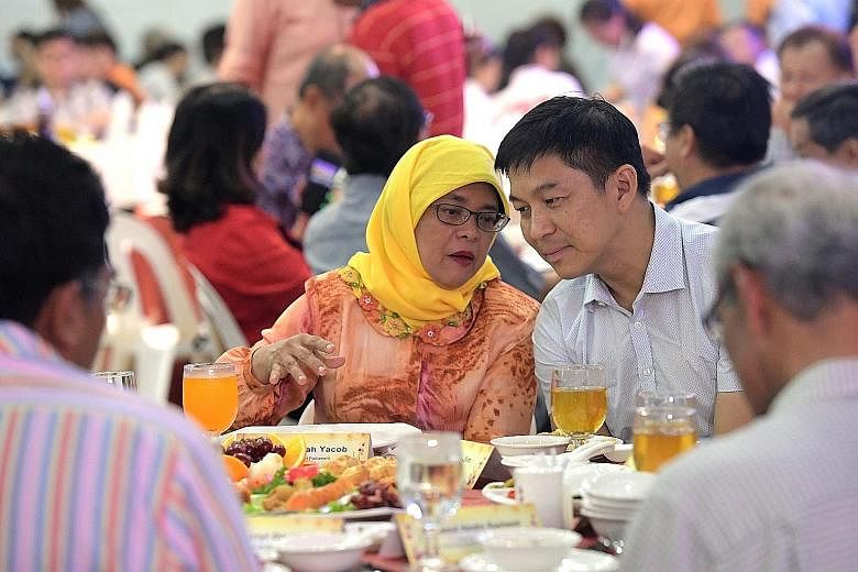President Halimah Yacob with Mr Tan at a Seventh Month auction dinner last month. He took up the post of Speaker of Parliament, which was vacated by Madam Halimah, who resigned to contest the presidential election. 