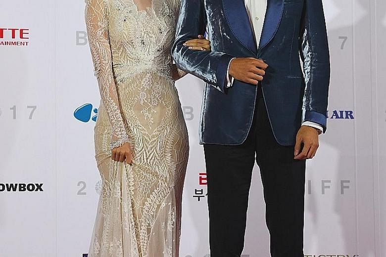 South Korean actress Im Yoon Ah and actor Jang Dong Gun on the red carpet at the festival's opening ceremony.