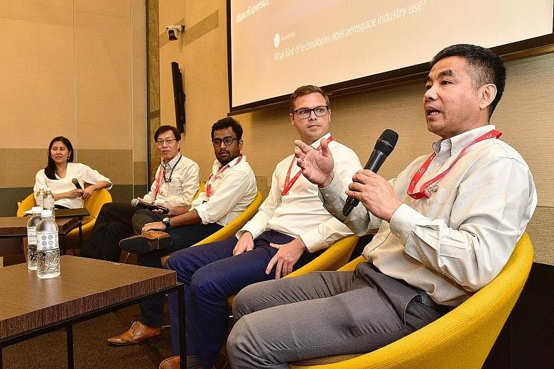 Ms Lynette Tan, executive director of the Singapore Space and Technology Association, who was the moderator at the Space Industry Awareness Talk, with the panellists, (from left) Mr Tan Khai Pang from Addvalue Technologies, Mr Rohit Jha from Transcel