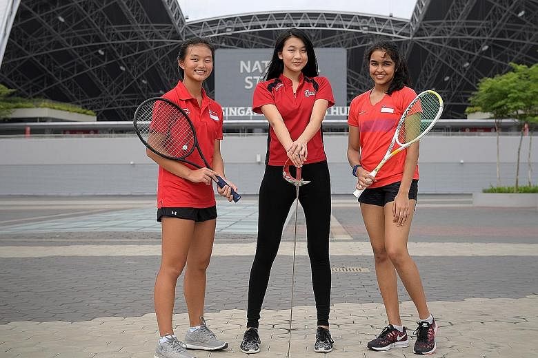 From left: Tennis player Clare Cheng, fencer Lau Ywen and squash player Sneha Sivakumar met at the 2012 Olympics as young journalists.