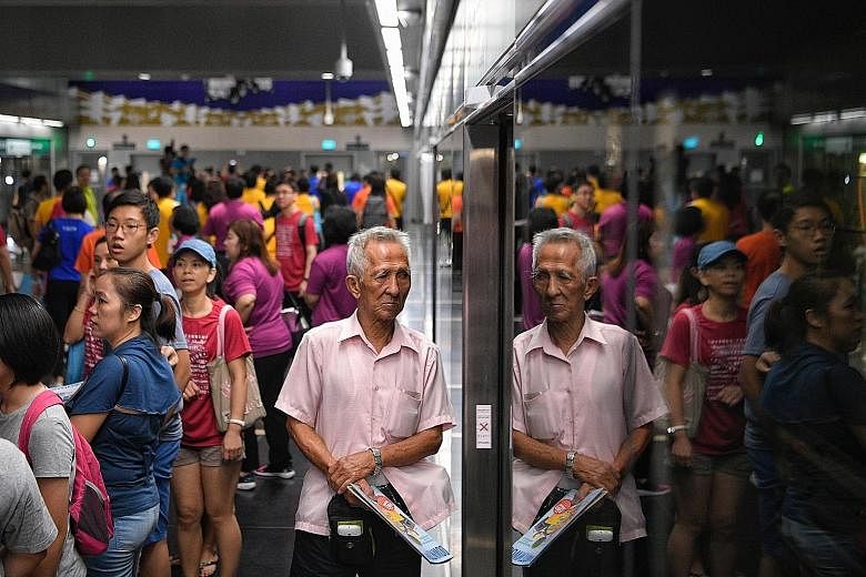 Commuters at Jalan Besar station during the Downtown Line 3 open house yesterday. The new stretch of the Downtown Line will open this Saturday.
