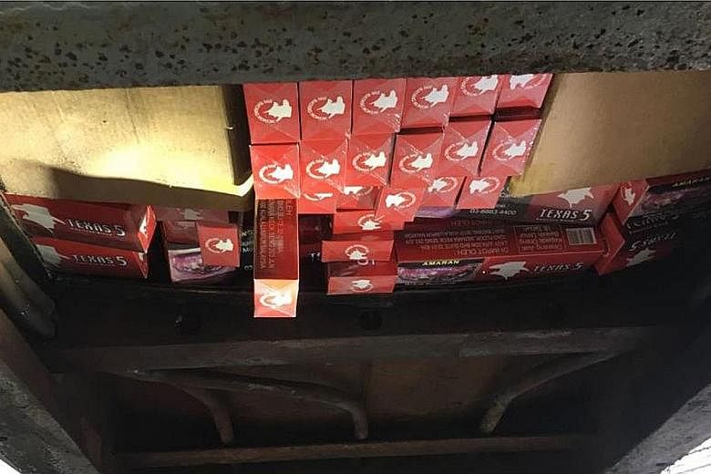 The 2,190 cartons and 202 packets of duty-unpaid cigarettes were found in a modified compartment at the base of the fuel bowser of the prime mover at Tuas Checkpoint. ICA officers had noticed anomalies in the scanned image of the empty fuel bowser.