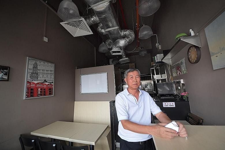 Businessman Chua G.S. is upset that the restaurant space he bought did not have an exhaust system, and he - and other unit owners - have had to fork out money to put one in.