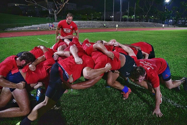 National rugby coach Frazer McArdell observing his charges on the scrum. They kick off their Asia Rugby Championship Division 2 campaign against India on Nov 15 in Taipei.