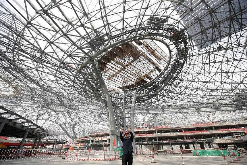 The terminal hall of the new airport, which is slated to open in October 2019. It is expected to serve an initial 45 million passengers a year with an eventual capacity of 100 million. The facility is located 67km south of Beijing, and is linked to t