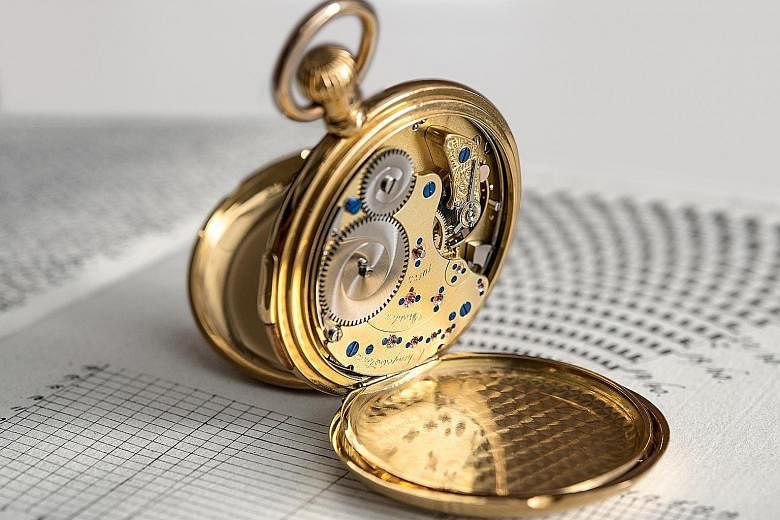 Rare pieces from A. Lange & Sohne, such as this pocket watch (above), are featured at the 100 Masterpieces exhibition. From top: Lange 1, Tourbillon Pour Le Merite, Arkade and 1815 Annual Calendar.