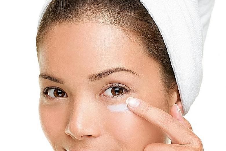 Use your fingers to apply eye cream in a rolling circular motion under the eye, from the nose bridge towards the temple, to improve lymphatic drainage and ease puffiness.