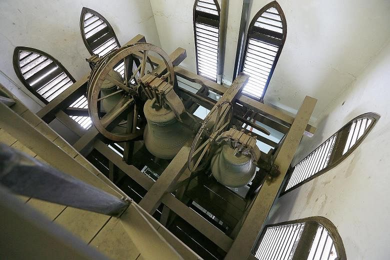 The heavy brass bell in the belfry of the church in Hougang was hoisted in place more than a hundred years ago by its head priest - and still chimes every day to mark the start of mass. Mr Bernard Braberry, the church administrator, also conducts his
