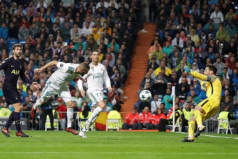 Real Madrid striker Karim Benzema (No. 9) missing a gilt-edged chance in the second half with Spurs goalkeeper Hugo Lloris pulling off a splendid save. Both sides will lock horns again on Nov 1 at Wembley.