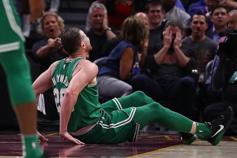 The Boston Celtics' Gordon Hayward lying stricken on the court after breaking his ankle.
