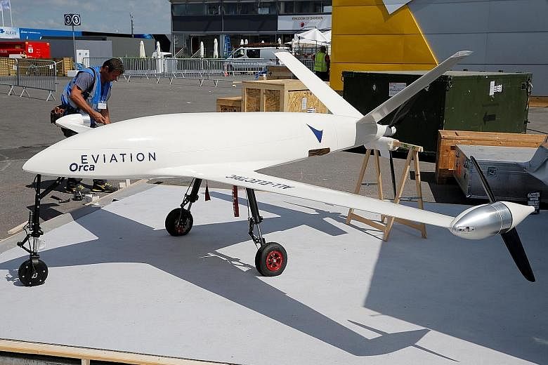 An electric UAV "Orca", made by Eviation, being prepared for static display at the 52nd Paris Air Show in June. Eviation is intent on returning with a full-scale electric aircraft capable of carrying passengers in 2019.