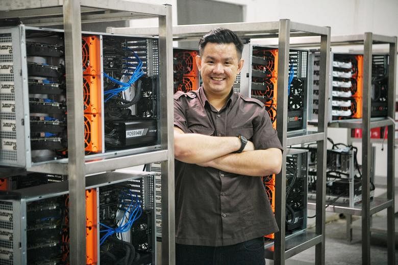 Mr Lim Hong Zhuang, seen here at a Chi-X (pronounced "kai axe") data centre, says people now look more at how cryptocurrency technology can be developed, rather than just the idea of profiting from digital currencies. His firm builds data centres to 