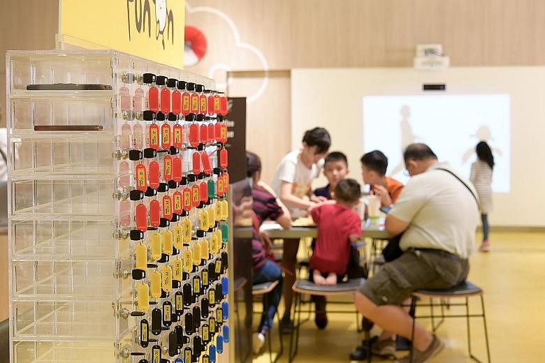 McDonald's Singapore has launched an initiative to get diners to set aside their mobile phones and spend more time interacting with others at the table. The fast-food firm said on Monday that it has set up a mobile phone locker at its Marine Cove out