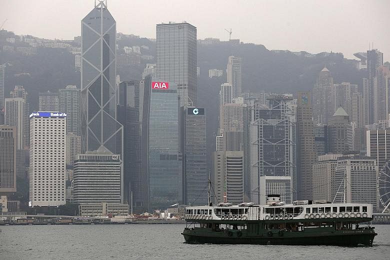 Hong Kong's value of AIA's new business expanded by double digits, helped by an increase in the number of active agents and a shift to more profitable products.