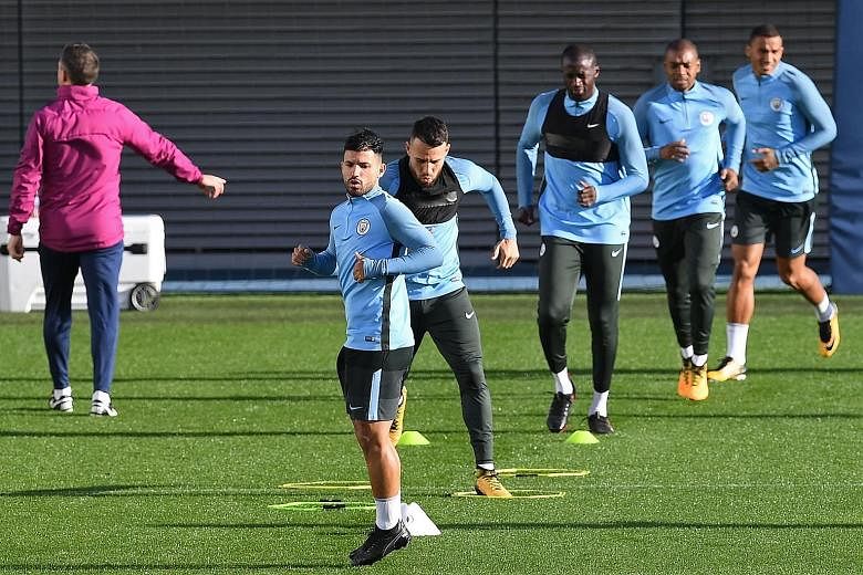 Sergio Aguero leads Manchester City's training earlier this week. The Argentinian is his side's joint top scorer in the league with six goals so far, equalling the tallies of team-mates Gabriel Jesus and Raheem Sterling.