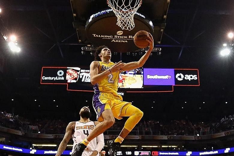 Los Angeles Lakers point guard Lonzo Ball made 12 of his 27 shots against Phoenix and was decisive after the break, as he scored 20 of his game-high 29 points to help his team record their first win of the season.