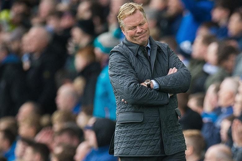 Everton manager Ronald Koeman looking on helplessly during the 5-2 home defeat by Arsenal on Sunday. The Toffees sacked the Dutchman after the loss left them in the Premier League relegation zone.