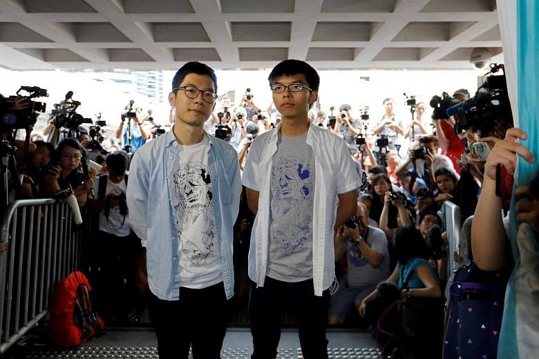 Hong Kong's Pro-democracy Activists Joshua Wong, Nathan Law Out On Bail ...