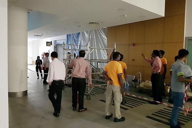 Water leaking from a drainage pipe above the false ceiling had seeped through and caused the ceiling to fall, said an SMU spokesman. SMU's ground team responded immediately, cordoning off the area and clearing the mess.