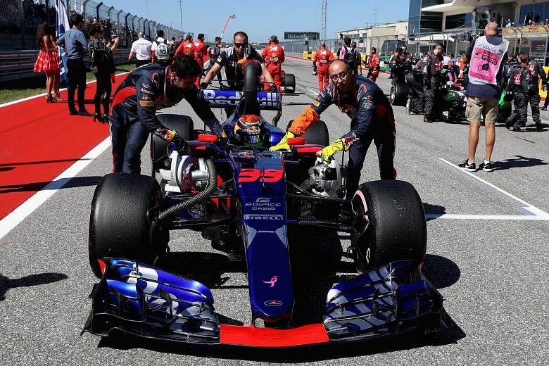 Toro Rosso driver Brendon Hartley of New Zealand is pushed onto the grid for his Grand Prix debut in Austin last Sunday. He finished 13th and will be partnered by Pierre Gasly for the Mexican Grand Prix this weekend.