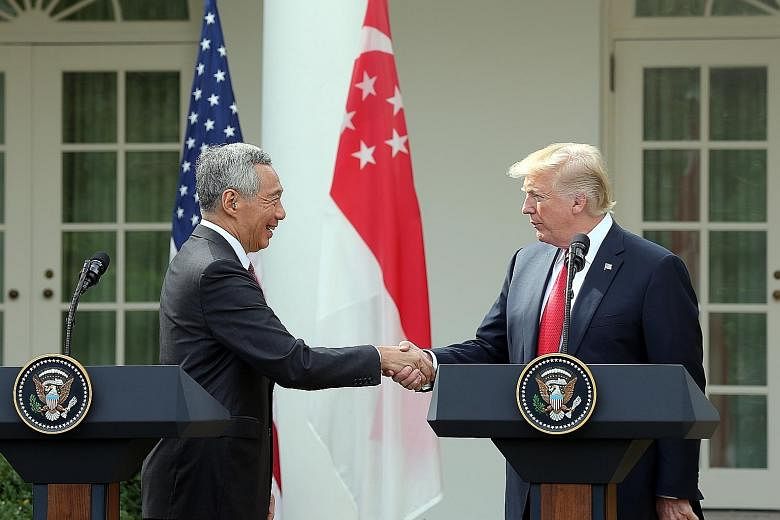 Prime Minister Lee Hsien Loong with US President Donald Trump at the Rose Garden of the White House on Monday. Both leaders spoke of the robust and enduring relationship between their two countries, with Mr Trump saying: "We are fortunate to have suc