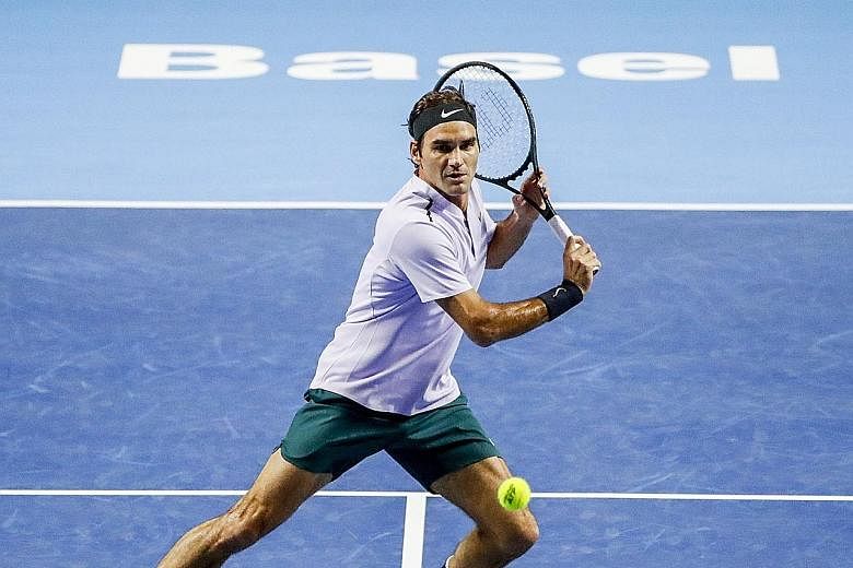 Roger Federer in action against Frances Tiafoe at the Swiss Indoors. The world No. 2 still has a chance of ending this season as No. 1.