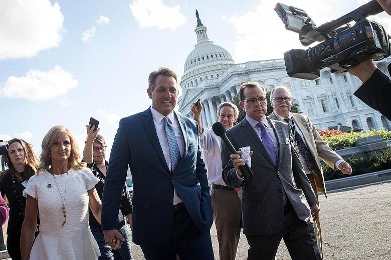 Left: Senator Jeff Flake and his wife, Cheryl, leaving the US Capitol on Tuesday after he announced he would not be seeking re-election. Above: Senator Bob Corker renewed his attack on and war of words with President Donald Trump.