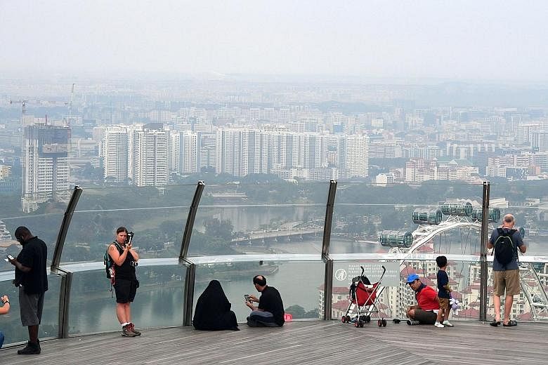 The recent hazy conditions in Singapore are due to accumulated particle matter under light winds, according to the National Environment Agency (NEA). NEA, which issues daily updates on the haze situation, first warned that Singapore may experience "s
